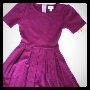 LuLaRoe Amelia Dress. She has pockets!!!